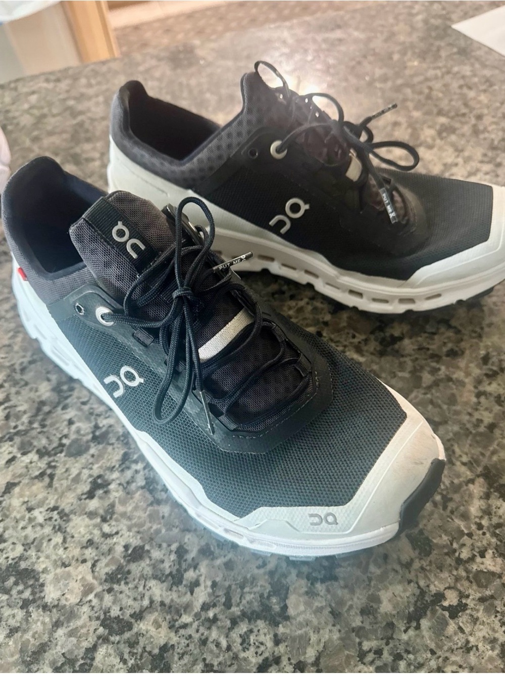 On Running women's Black and White Athletic shoes